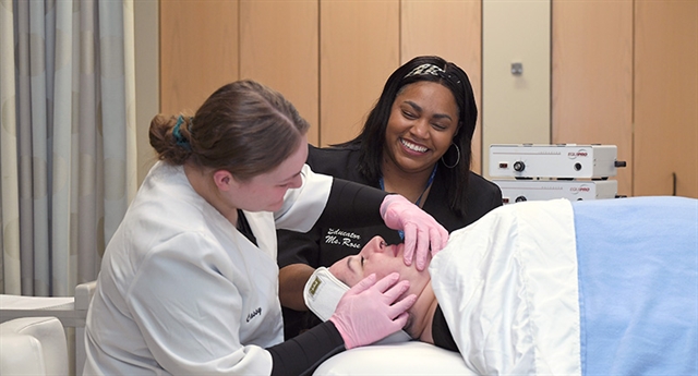 Student giving facial in WCTC Aesthetics Spa