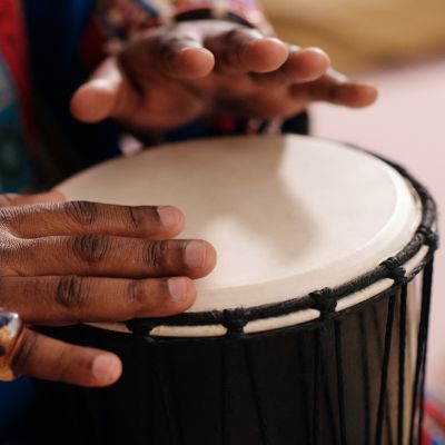 Hands playing drum