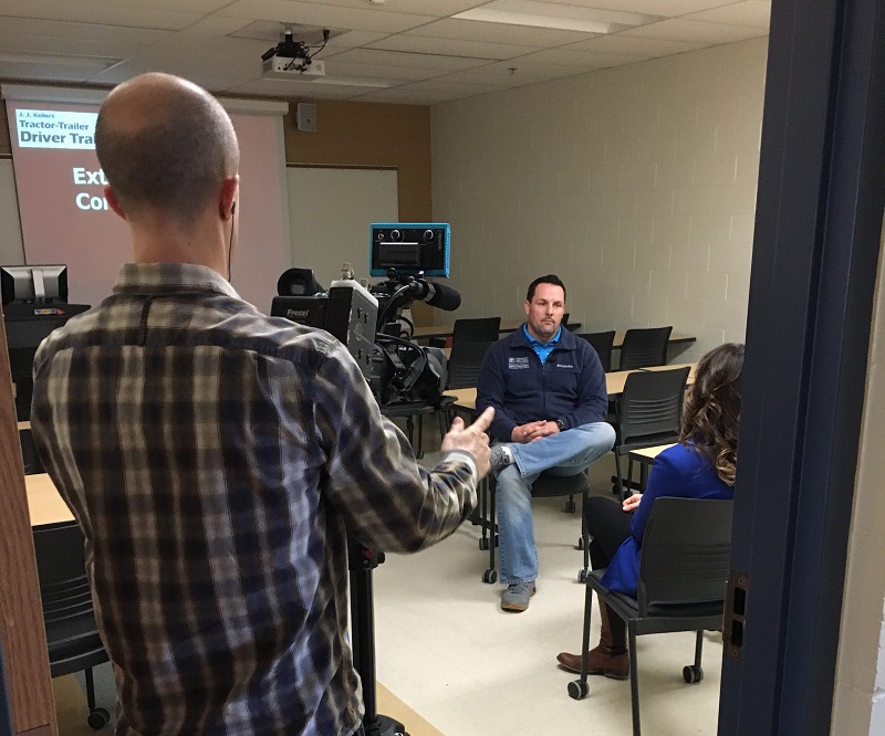 TMJ4 reporter Coreen Zell interviews WCTC Truck Driving instructor Jeff Kiel