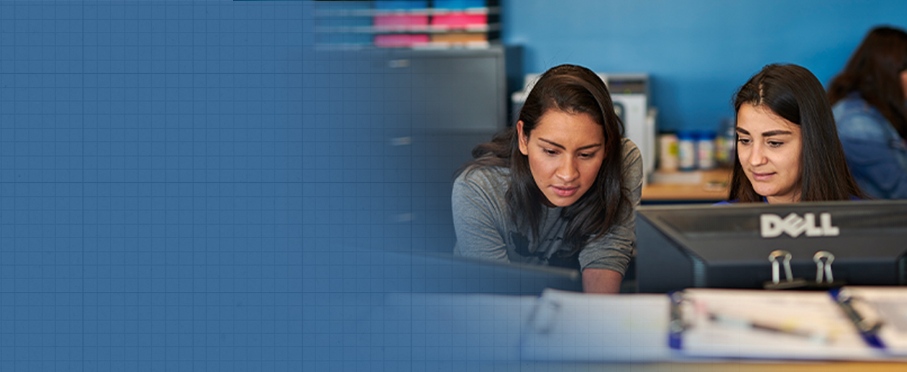 Students working together at computer